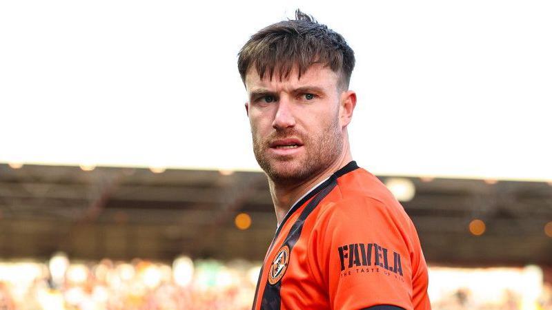 Ryan Strain in action for Dundee United