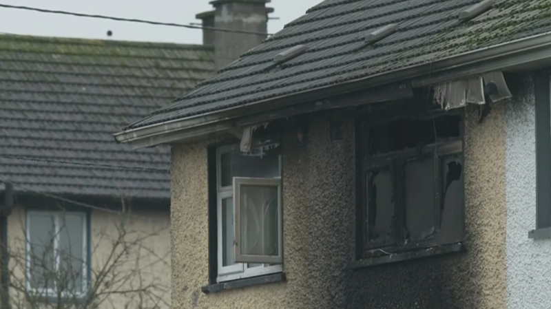 Murder investigation after child and woman die in house fire