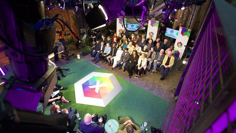 The candidates debating in front of a studio audiences 