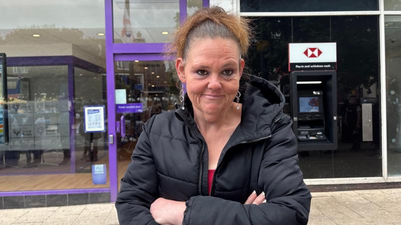 Parents debate costs in queue for school uniform