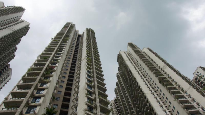 These seaside apartments were a ghost city - then police say scammers moved in
