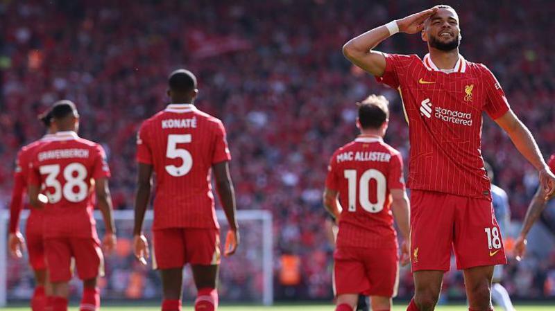 Cody Gakpo celebrates Liverpool's third goal