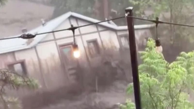 Moment house is swept away in New Mexico flash flooding