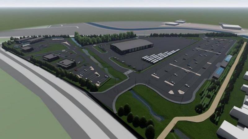 An artist impression of a proposed park-and-ride site near Hull. The computer-generated image shows a large grey coloured car park and several industrial-style buildings.