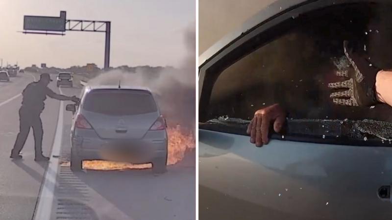 Watch: US police officer pulls man from burning car