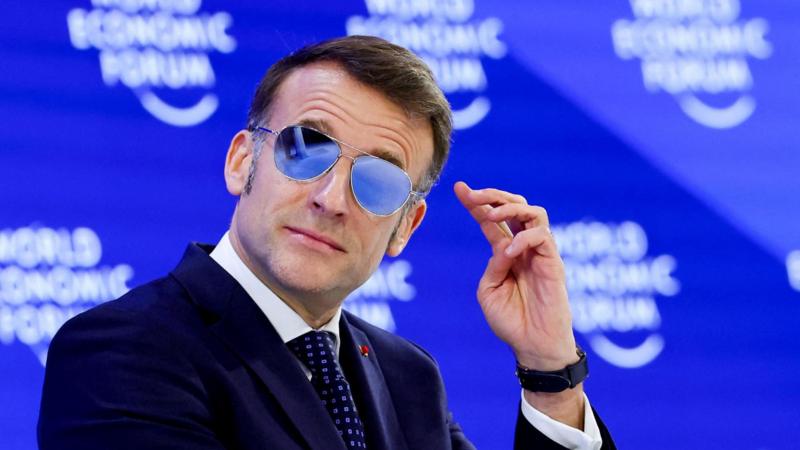 Why is Emmanuel Macron wearing sunglasses at Davos?