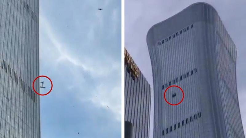 Debris falls after plane hits Beijing's tallest building