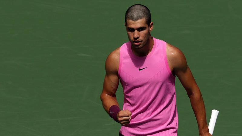 Alcaraz 'not an early person' but cruises through