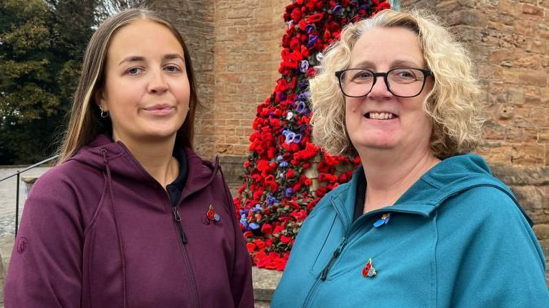 Eleanor Lang and Elizabeth Lang stood infront of Saint Mary's church in Bulwell.