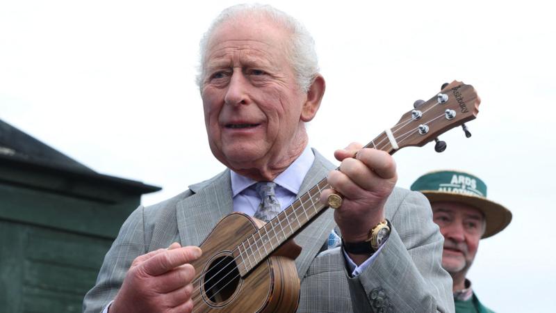 King Charles plays ukulele on final day of NI trip