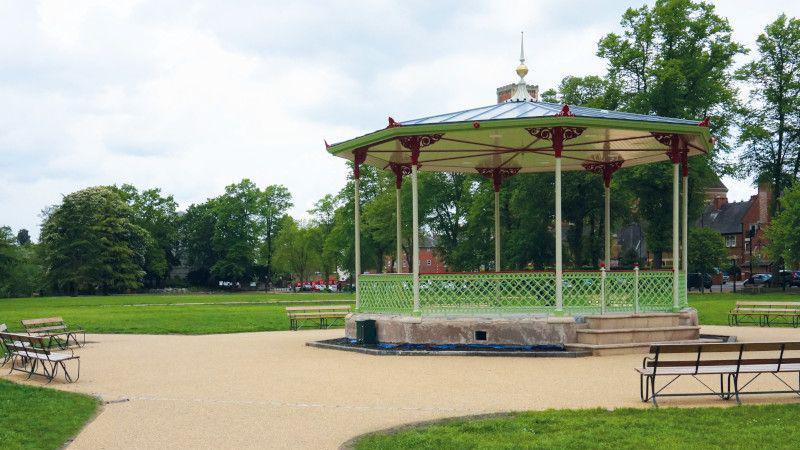 A bandstand in the centre of a park 