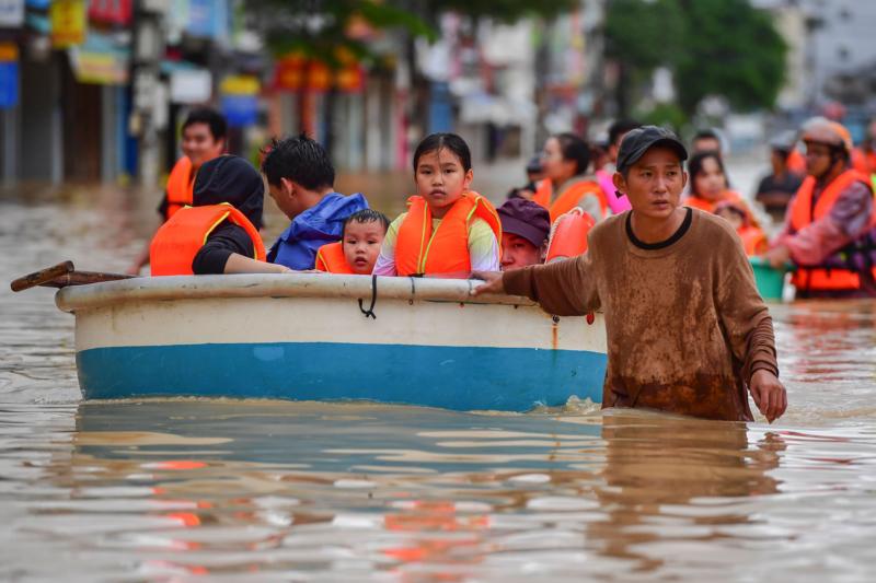 Vietnam floods leave at least 90 dead and 12 missing