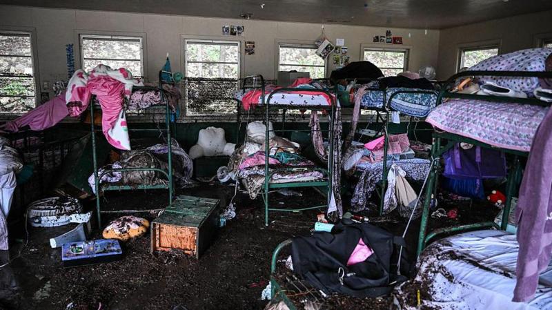 Texas camp where 25 girls died drops reopening plans after parents protest