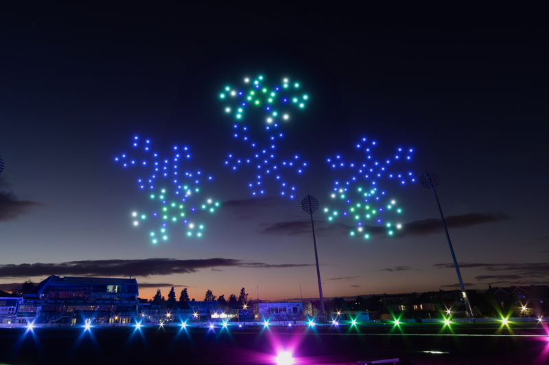 Drones forming the pattern of green and blue snow flakes in the night sky over Trent Bridge cricket ground