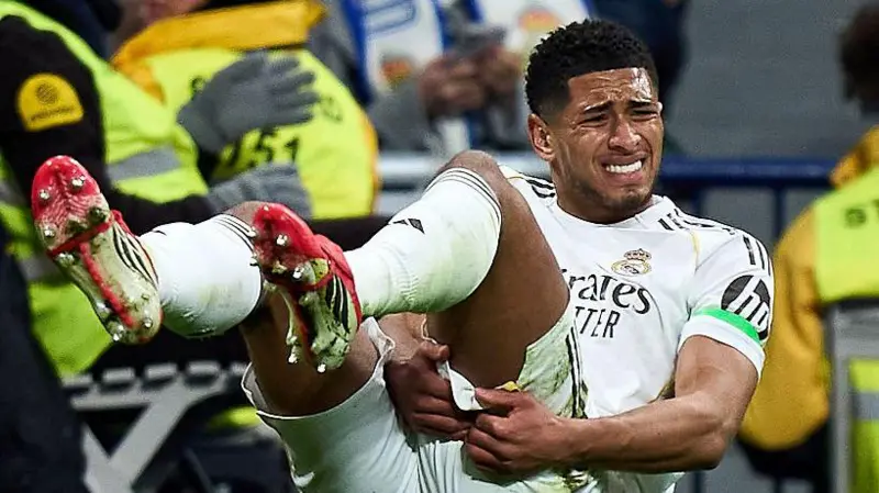 Jude Bellingham of Real Madrid goes down with an injury during the La Liga match between Real Madrid and Rayo Vallecano