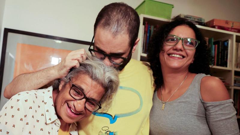 British-Egyptian activist reunited with family