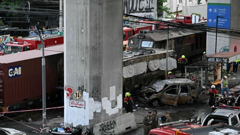 Freight train and bus crash kills at least eight in Bangkok