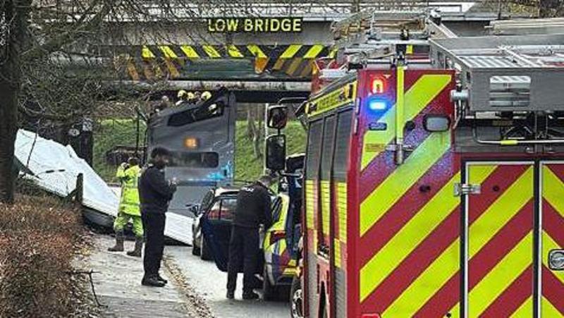 Children hurt as school bus roof ripped off by bridge