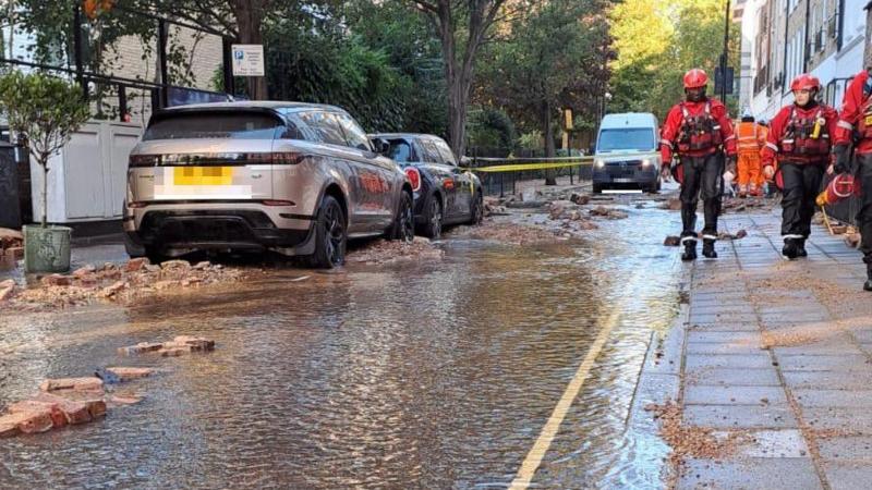 Court closed and homes evacuated after burst pipe floods road - BBC News
