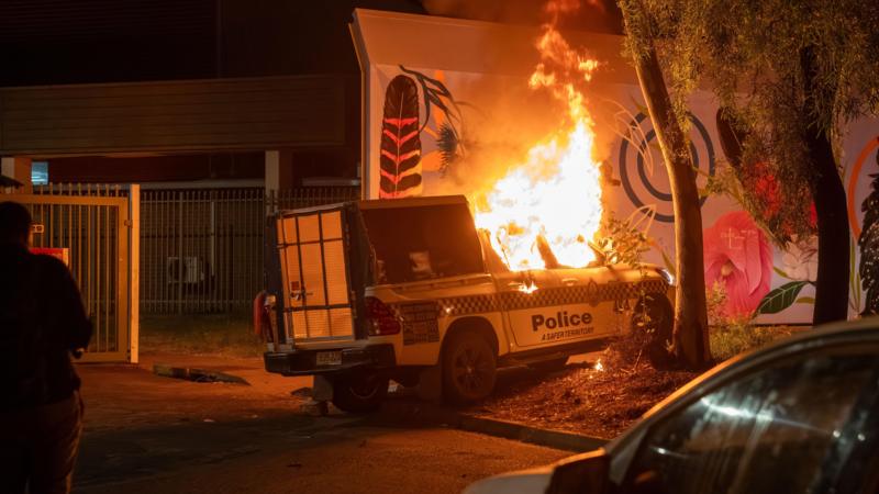 Violence in Australian town after arrest of man over girl's murder