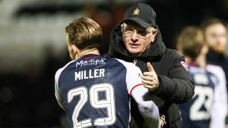 Calvin Miller with Falkirk manager John McGlynn