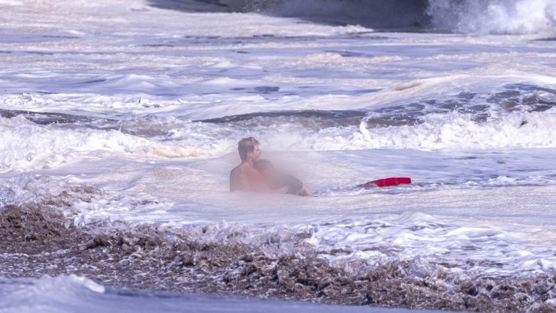 Bystander video shows teen lifeguard's dramatic ocean rescue