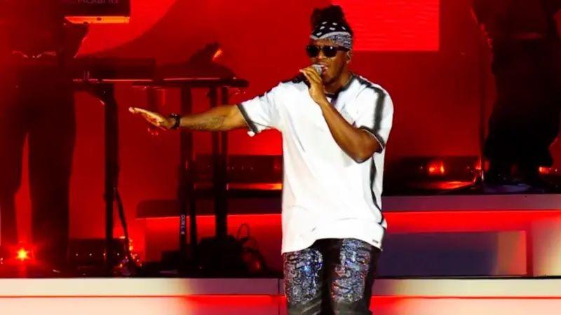 KSI performs on stage.