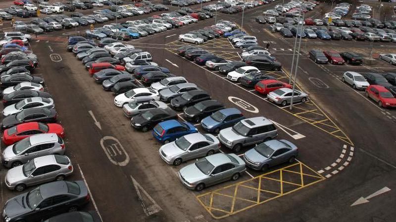 Cars parked in a car park