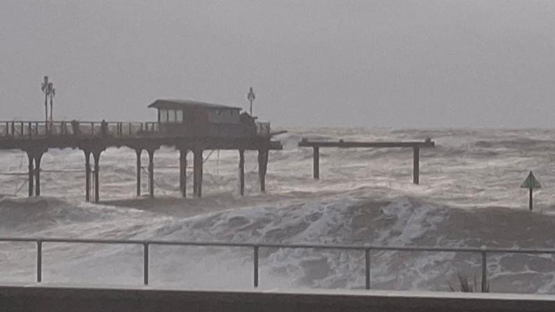 Part of historic pier washes away in 'wild' storm