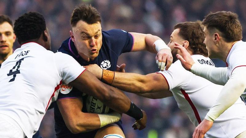 Jack Dempsey carries the ball into contact for Scotland against England as Maro itoje, Luke Cowan-Dickie and Tommy Freeman challenge