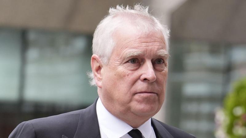 Andrew in custody as police search two addresses