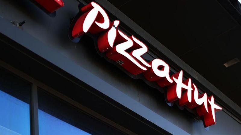 Pizza Hut's parent company explores sale of struggling chain