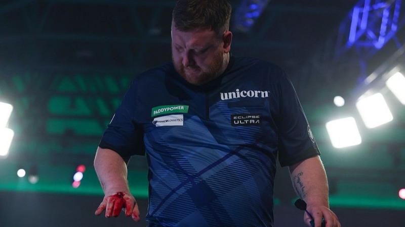 Menzies punches drinks table after Worlds loss