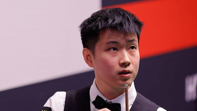 Zhao lets early lead slip as Murphy fights back