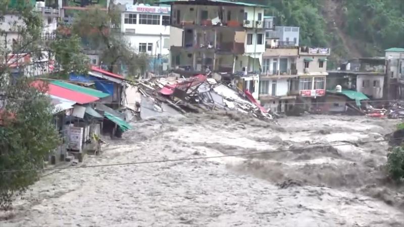 Homes damaged, cars swept away as rains flood India's Uttarakhand