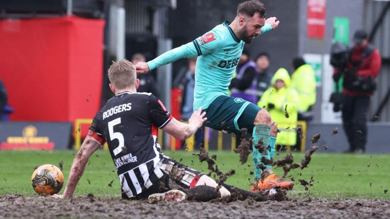 'A throwback' - Wolves beat Grimsby in FA Cup mudbath
