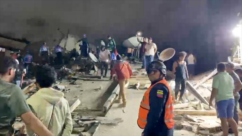 Venezuelan rescuers search through building rubble for survivors