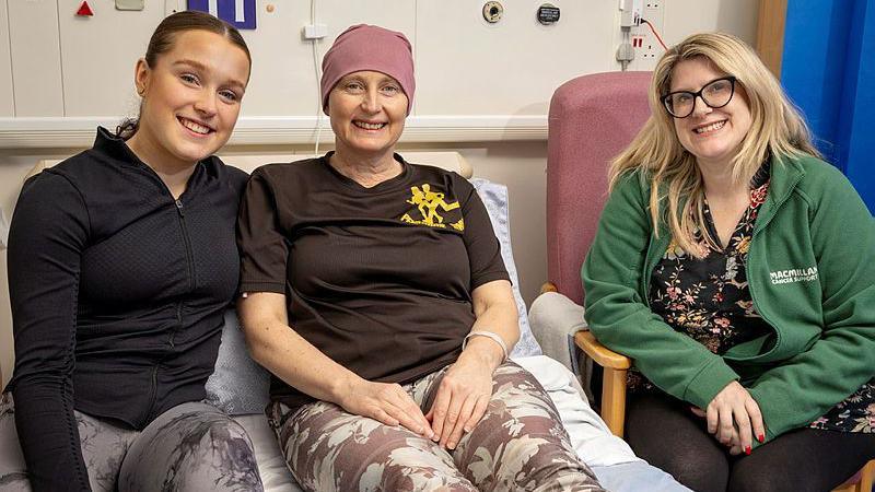 Ruth with daughter Natasha and Kelly (in green Macmillan jacket).