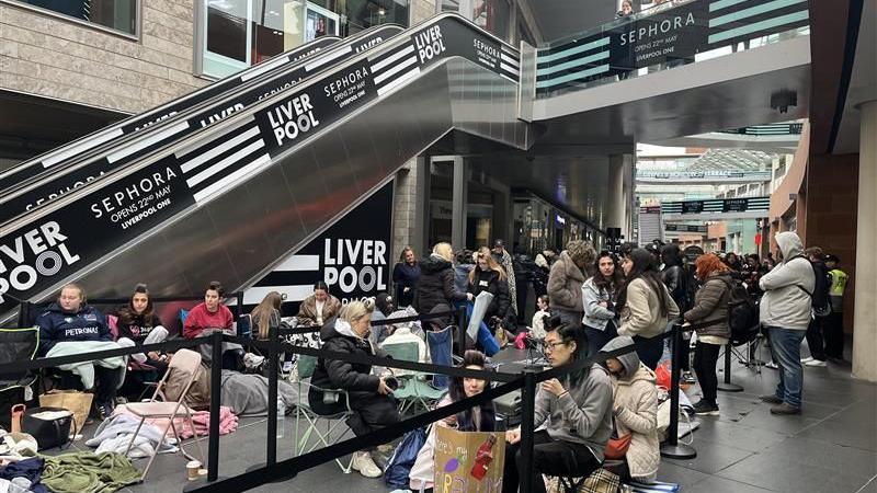 People camp out in the open in Liverpool ONE outside the new Sephora store. People can be seen say in sleeping bags and stood queuing outside the entrance.