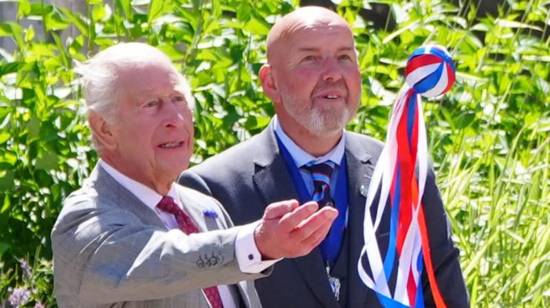 King Charles takes part in historic Borders hand ba' game