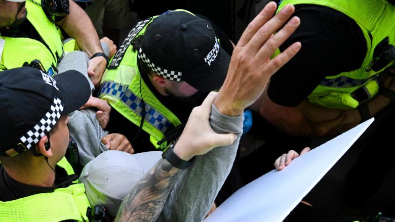 Six charged with terrorism offences over support for Palestine Action