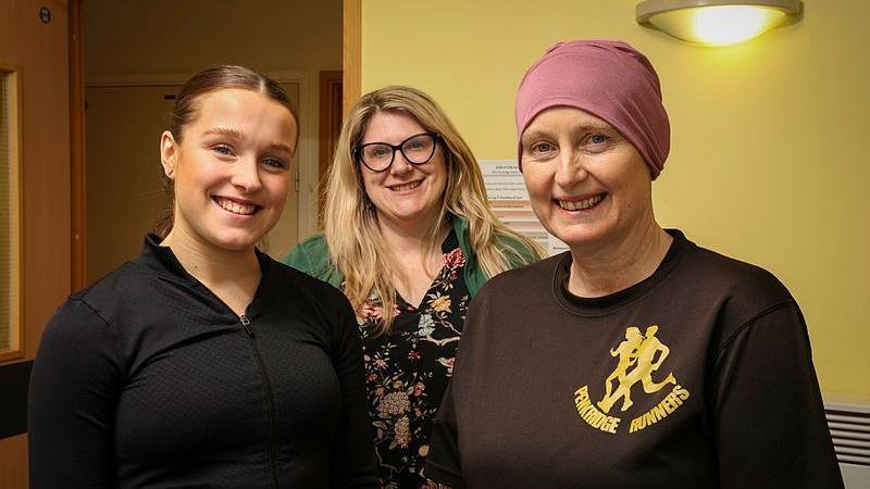 Ruth with daughter Natasha and Kelly (in green Macmillan jacket).