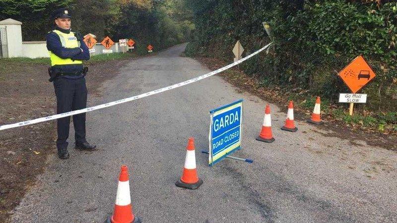 Gardaí (Irish police) have cordoned off a rural road outside Macroom