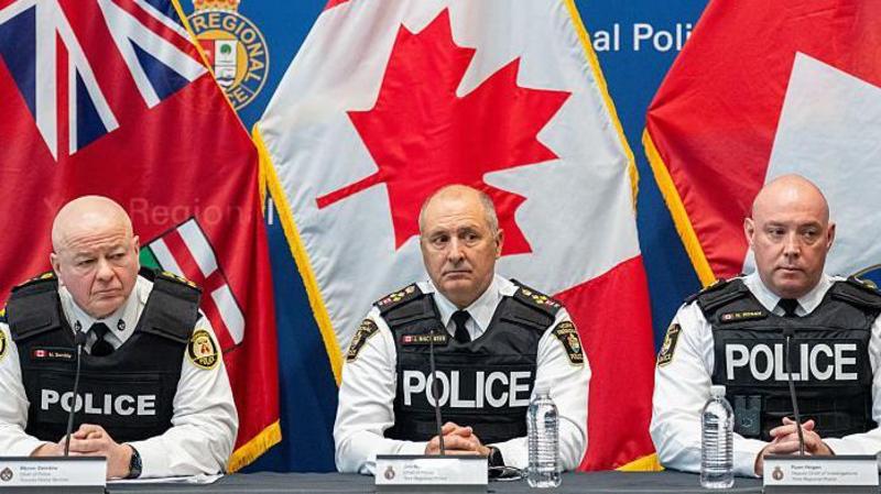 Seven Toronto police officers arrested in corruption probe