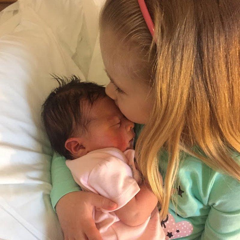 "Unconditional love from the very moment they set eyes on each other": Elle, 4, meeting baby Brooke, born on 12 April 2018