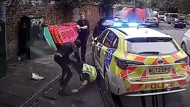 Footage shows moment officers are stabbed in ambush