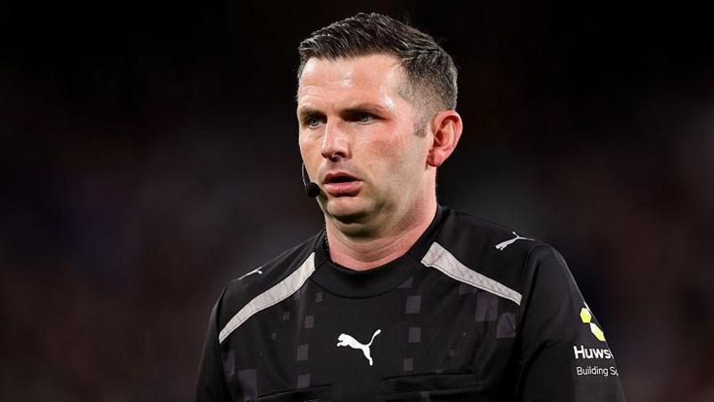 Injured referee Oliver to miss World Cup match