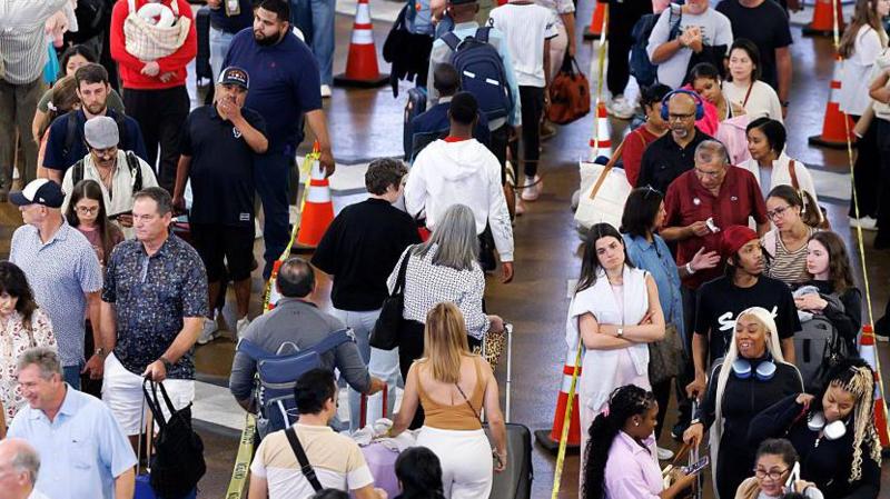 Trump orders airport security paid as travellers face hours-long queues