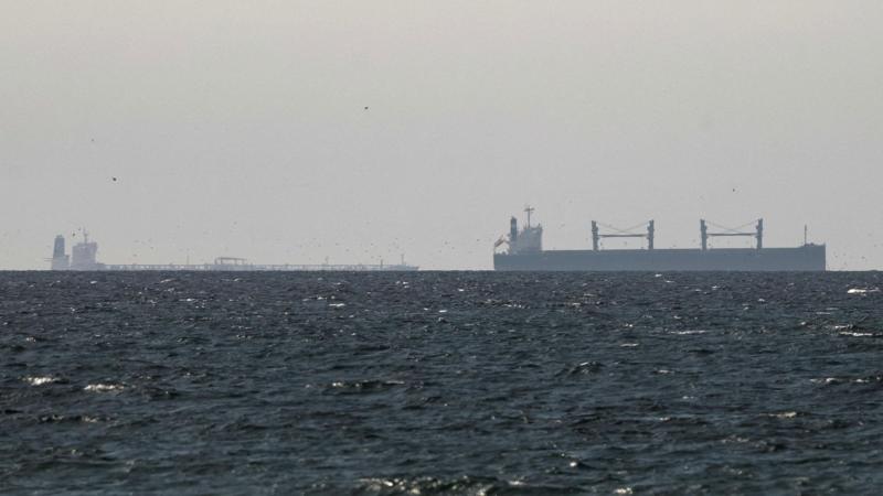 Iran says Strait of Hormuz is 'open' but tracking shows few ships moving