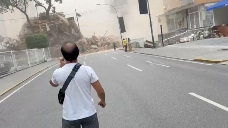 Collapsed buildings in Caracas after quake